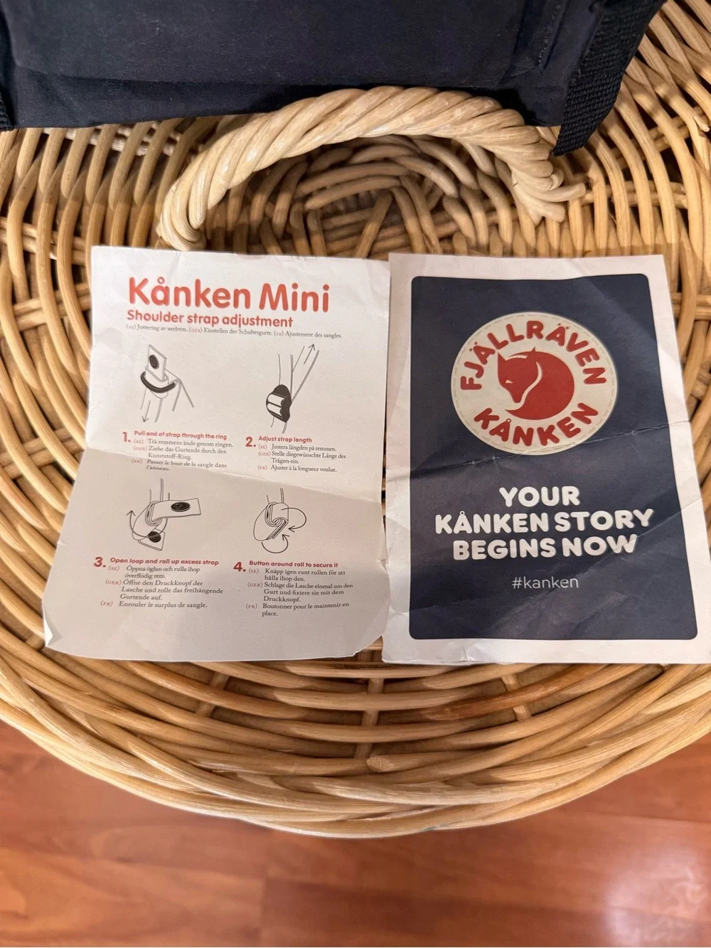 Fjallraven Kanken Mini Backpack in Black with Red Logo